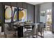 Elegant dining room with dark wood table and access to patio at 3030 Hutton Gardens Ln, Charlotte, NC 28269