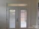 French doors leading to a screened porch at 319 Lifestyle Ct # 16, Cramerton, NC 28056