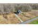 Home situated on a large lot with a long driveway; aerial view at 4006 Sincerity Rd, Monroe, NC 28110