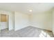 Bedroom with door to hallway and carpet flooring at 5404 Verona Rd # 36, Charlotte, NC 28213