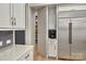 Modern kitchen features stainless steel appliances and ample storage at 10125 Laurier Ln, Huntersville, NC 28078