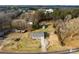 Aerial view of a house with a large yard and surrounding area at 103 Airport Rd, Stanley, NC 28164