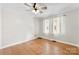 Spacious bedroom with hardwood floors and ceiling fan at 103 Airport Rd, Stanley, NC 28164