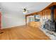 Living room featuring a wood stove and hardwood floors at 103 Airport Rd, Stanley, NC 28164