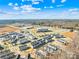 Aerial view of townhome community and nearby businesses at 10776 Overlook Mountain Dr, Charlotte, NC 28216