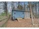 Blue storage shed with additional outdoor storage space at 13005 Seascape Ln, Charlotte, NC 28278