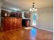 Kitchen dining area with hardwood floors and door to backyard at 1361 Fairhope Rd, York, SC 29745