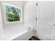 Bathroom with garden tub and wood-look flooring at 2754 Crowders Creek Rd, Gastonia, NC 28052