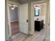 Updated bathroom with vanity, toilet and shower/tub combo at 505 N Hill St, Dallas, NC 28034