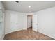 Bright bedroom with carpet flooring and two closets at 508 Hawley St, Charlotte, NC 28214