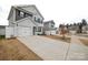 Two story house, gray siding, attached garage, and driveway at 508 Hawley St, Charlotte, NC 28214