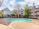 Shared courtyard pool and surrounding building at 509 N Graham St # 1G, Charlotte, NC 28202