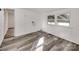 Laundry area with vinyl flooring and two windows at 718 Grover St, Gastonia, NC 28054