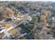 Aerial view of neighborhood with homes and trees at 7800 Highbanks Ct, Charlotte, NC 28212