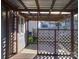 Covered back porch with wooden lattice at 7800 Highbanks Ct, Charlotte, NC 28212