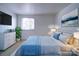 Main bedroom with dresser and large bed at 7800 Highbanks Ct, Charlotte, NC 28212