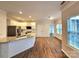 Kitchen with granite countertops, stainless steel appliances, and white cabinets at 9718 Mitchell Glen Dr, Charlotte, NC 28277