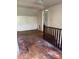 Upper hallway with hardwood floors and open stairway at 1035 Gibson St, Albemarle, NC 28001