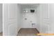 Functional laundry room with wire shelving at 6316 Honor Ave, Midland, NC 28107