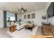Bright living room with a comfy sofa and large windows at 6316 Honor Ave, Midland, NC 28107