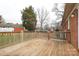 Spacious back deck overlooks a fenced-in yard with mature trees at 1723 Sunnybrook Dr, Rock Hill, SC 29730