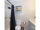 Clean bathroom with shower/tub combo and shelving at 1723 Sunnybrook Dr, Rock Hill, SC 29730