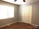 Bright bedroom with wood floors and double-door closet at 1857 Williams Cir, Lancaster, SC 29720