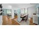 Bright dining room with hardwood floors and view into living area at 189 Giant Oak Ave, Statesville, NC 28677