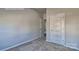 Bedroom with carpeted floor and doors to hallway at 191 Giant Oak Ave, Statesville, NC 28677