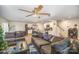 Living room with gray sofas, a view of the kitchen and stairs at 2137 Redstone Dr # 99, York, SC 29745