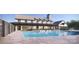 Resort-style pool with a large deck and adjacent clubhouse at 4107 Eastover Glen Rd # 0350, Charlotte, NC 28269