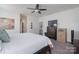 Main bedroom with ceiling fan, large closet, and dresser at 442 Hunton Forest Nw Dr, Concord, NC 28027