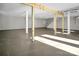 Unfinished basement with high ceilings and large windows at 623 Oak Grove Rd, Kings Mountain, NC 28086