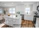 Virtually staged kitchen, features white shaker cabinets, marble countertops, and stainless steel appliances at 623 Oak Grove Rd, Kings Mountain, NC 28086