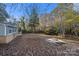 Spacious backyard with wooded area at 634 Colston St, Albemarle, NC 28001