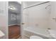 Bathroom with tub shower, toilet, and tiled floors at 634 Colston St, Albemarle, NC 28001