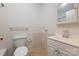 Clean bathroom with updated vanity and tiled walls at 634 Colston St, Albemarle, NC 28001