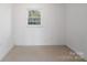 Empty bedroom with window and light walls at 634 Colston St, Albemarle, NC 28001