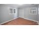 Spacious bedroom with hardwood floors and ample natural light at 634 Colston St, Albemarle, NC 28001