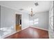 Bright dining room with hardwood floors and chandelier at 634 Colston St, Albemarle, NC 28001