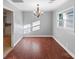 Bright dining room features hardwood floors and a chandelier at 634 Colston St, Albemarle, NC 28001