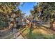 Charming ranch house with a walkway and mature trees at 634 Colston St, Albemarle, NC 28001