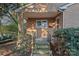 Inviting front porch with brick steps and metal railing at 634 Colston St, Albemarle, NC 28001