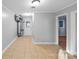 Clean hallway with tile floors and access to other rooms at 634 Colston St, Albemarle, NC 28001