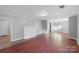 Bright living room with hardwood floors and fireplace at 634 Colston St, Albemarle, NC 28001