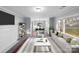 Bright living room with fireplace and large windows at 634 Colston St, Albemarle, NC 28001