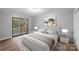 Main bedroom with sliding door to deck at 634 Colston St, Albemarle, NC 28001