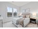 Bright bedroom with double bed, large windows, and neutral color palette at 7112 Wayfarer Dr # 0081, Charlotte, NC 28269