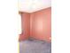 Simple bedroom with peach walls and neutral carpet at 107 Millet Dr # 25, Stony Point, NC 28678