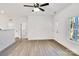 Bright and airy living room with hardwood floors and access to other rooms at 1121 Laurel St, Salisbury, NC 28144